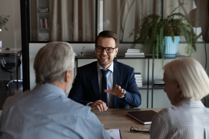 Client discussing asset protection and wealth preservation with attorney