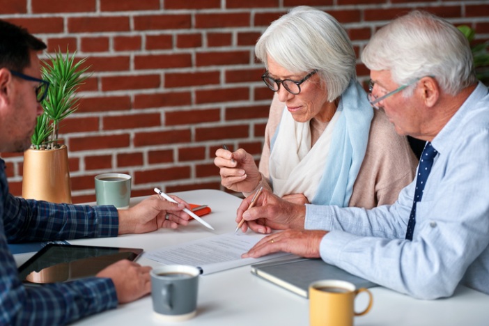 Client meeting with an attorney to discuss revocable trust planning