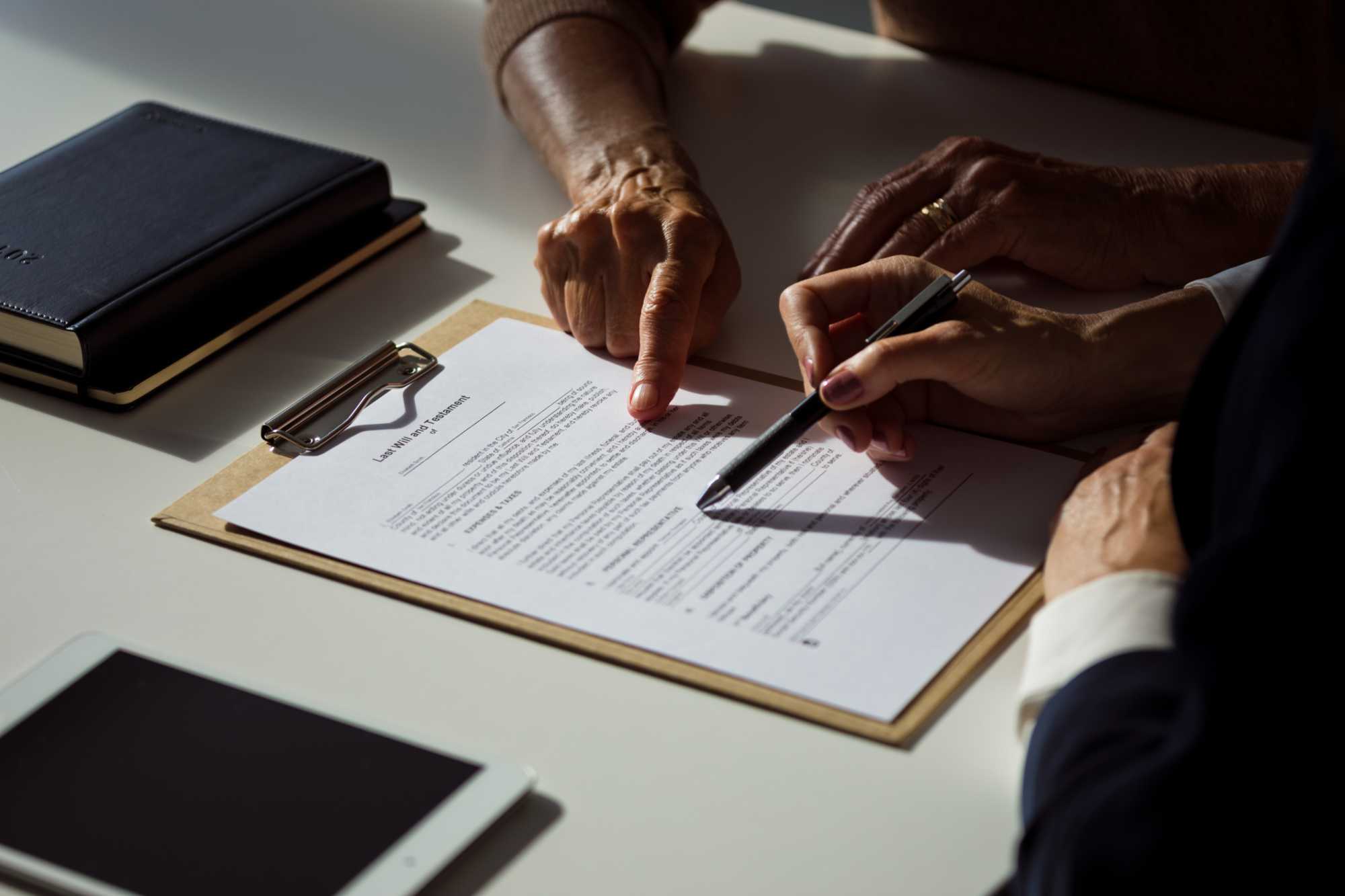 An elder woman executing estate planning for blended family in Palm Coast, FL